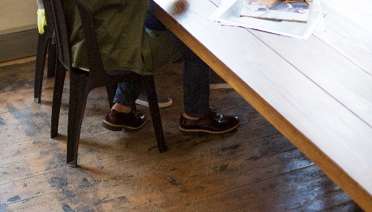 Two men collaborating to build a network lab.