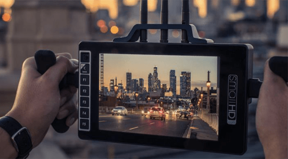Camera viewfinder capturing a city skyline