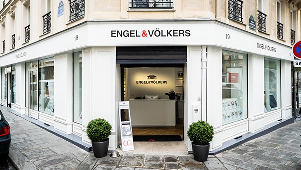 Small Engel & Völkers building office on a city street corner
