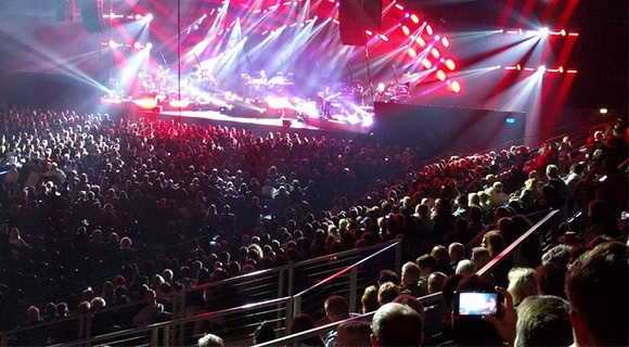 Spectator films a performance on his mobile phone in a packed König-Pilsener-ARENA